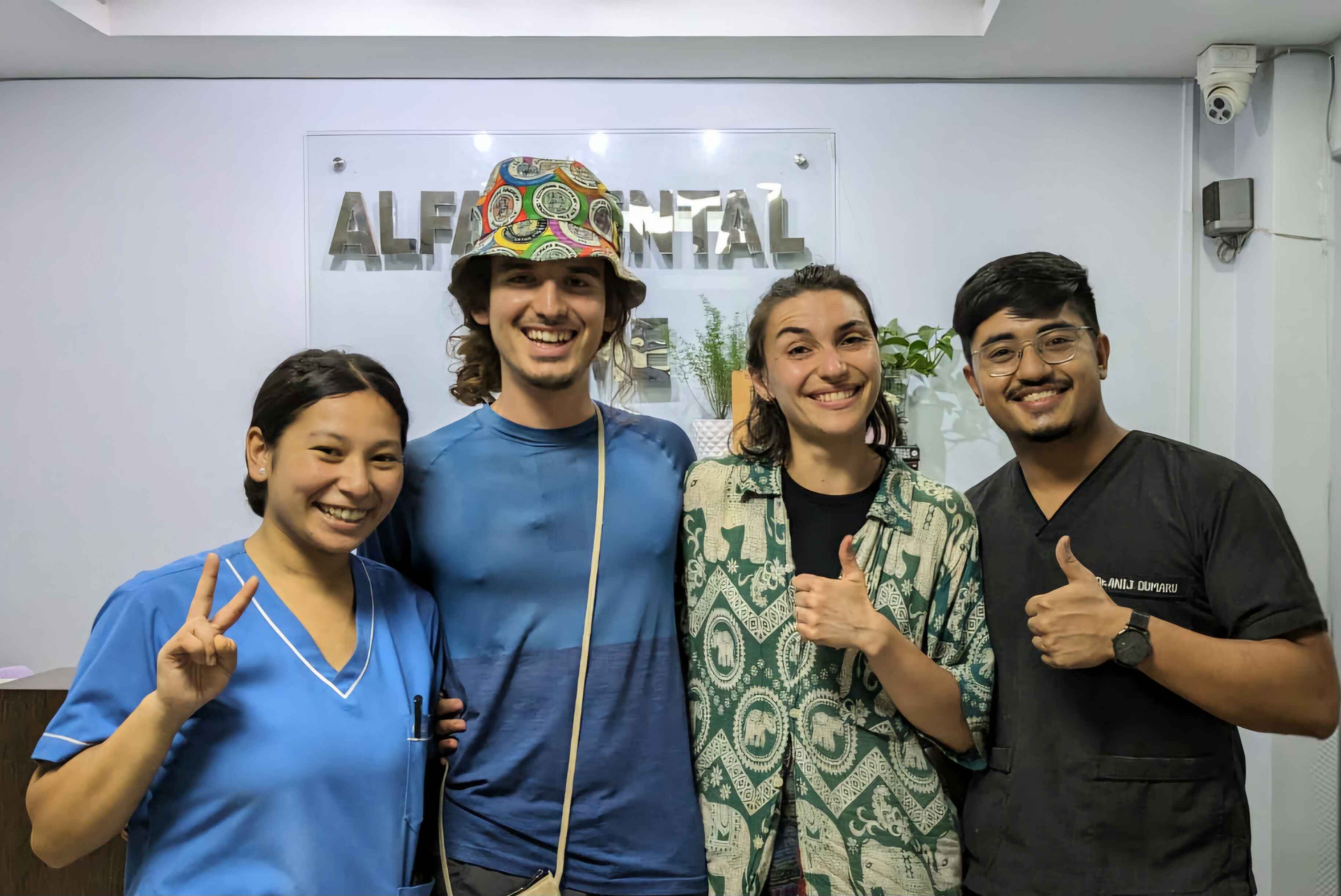 patients similing with dental staff